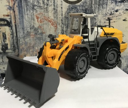 Трактор желтый с ковшом JCB