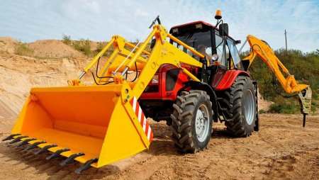 Экскаватор-погрузчик Амкодор 703м