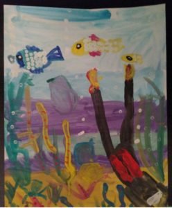 Аквалангист фотографирует кораллы аппликация