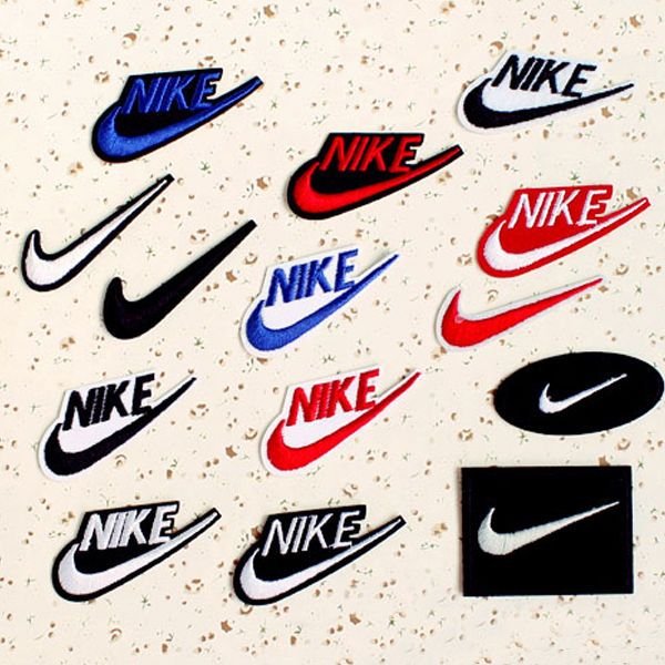 Найк язык. Вышивка свуш Nike. Нашивка Swoosh Nike кастом. Nike Swoosh logo Embroidered.