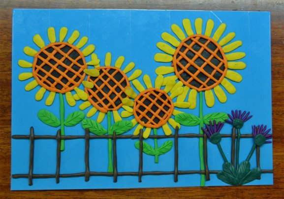Плетень с подсолнухами лепка