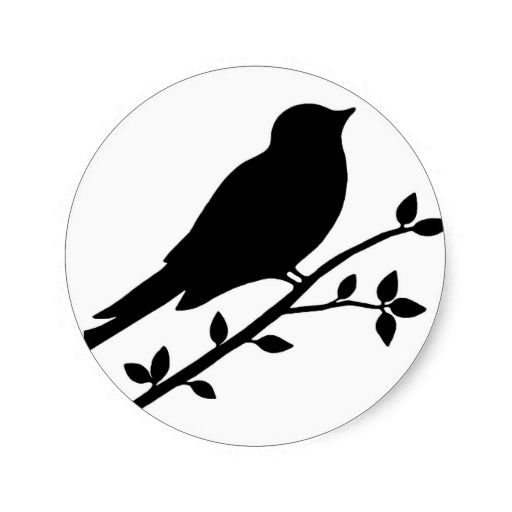 Силуэт птицы на ветке