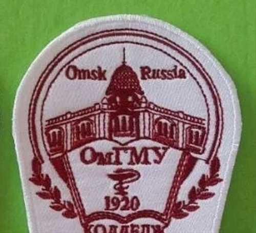 Герб ОМГМУ колледж