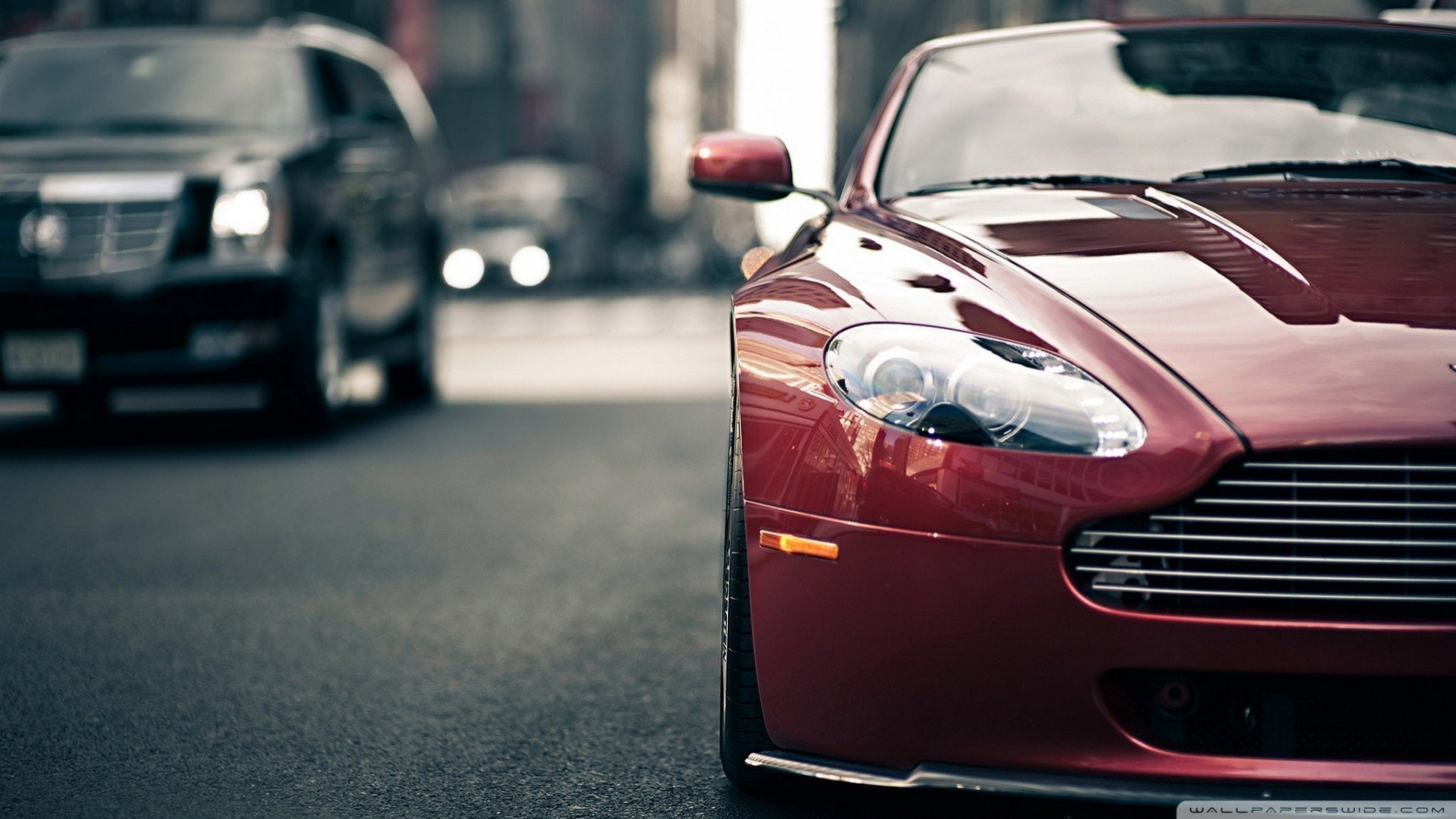Сайт про автомобили. Aston Martin. Aston Martin DBS v8. Машина на красивом фоне.