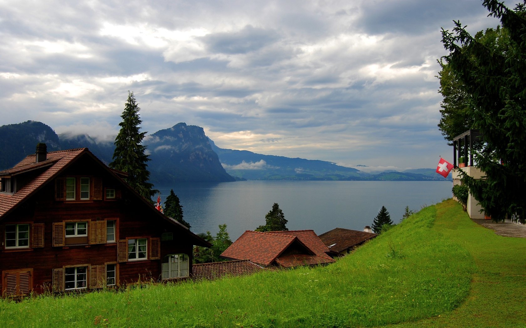 Горы домики озеро. Фахверк Швейцария горы озеро лес. Аппенцелль Швейцария. Дом в горах у озера в Швейцарии. Фахверк Швейцария горы озеро лес лето.