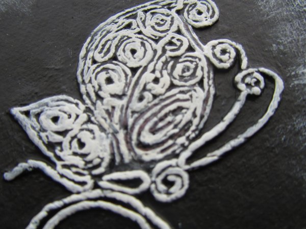 Аппликация из скрученных жгутиков