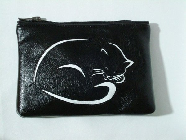 Косметичка с аппликацией из кожи