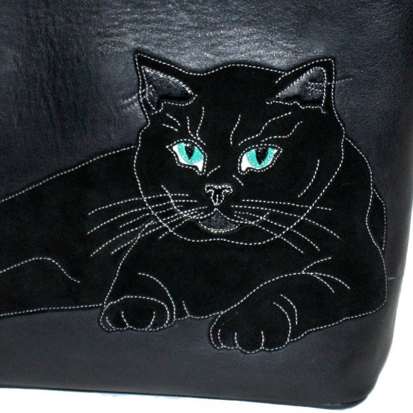 Аппликация из кожи