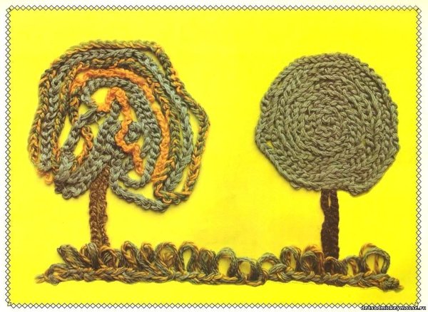 Панно из вязаных косичек