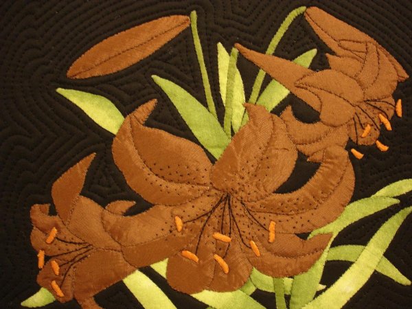 Аппликация из кусочков кожи