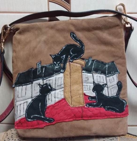 Аппликация из кожи