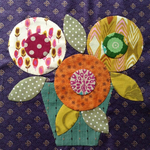 Аппликация из лоскутков ткани