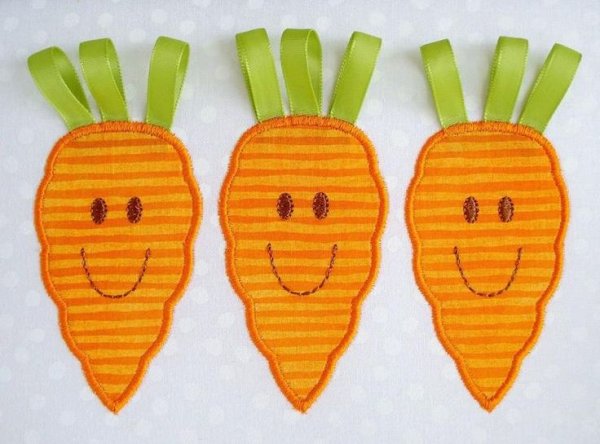 Аппликация из ткани морковка