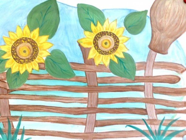 Плетеный забор с подсолнухами