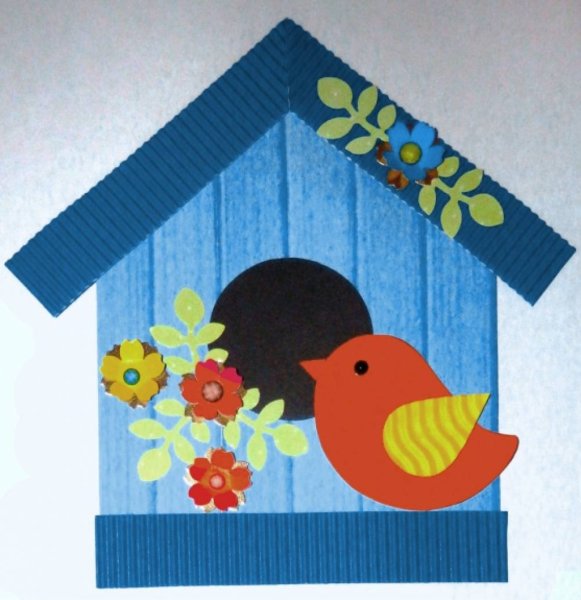 Птичка из цветной бумаги