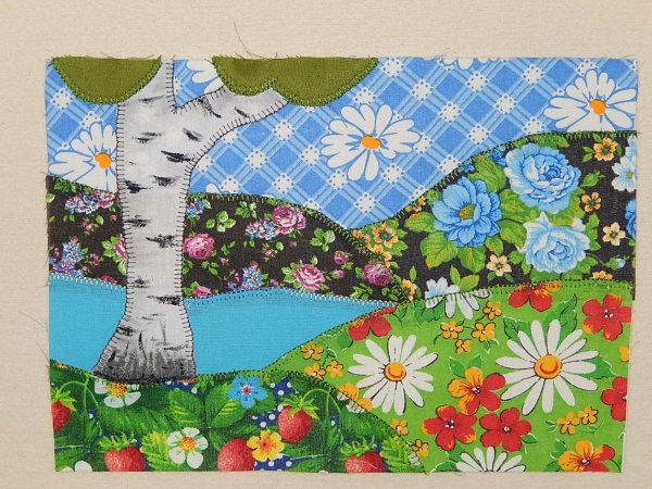 Аппликация из лоскутков ткани