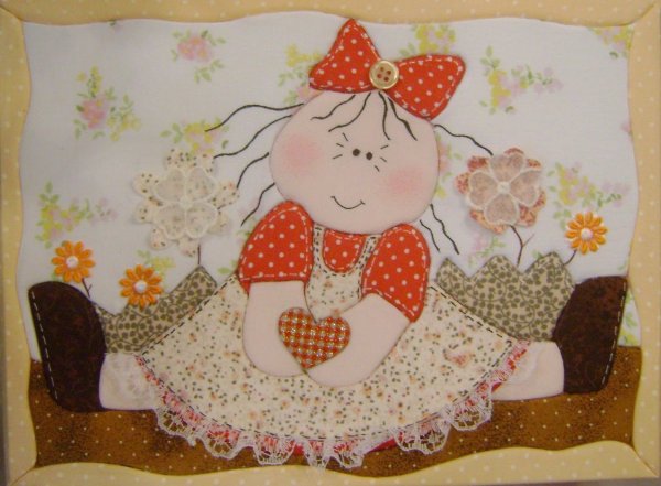 Аппликация из лоскутков ткани