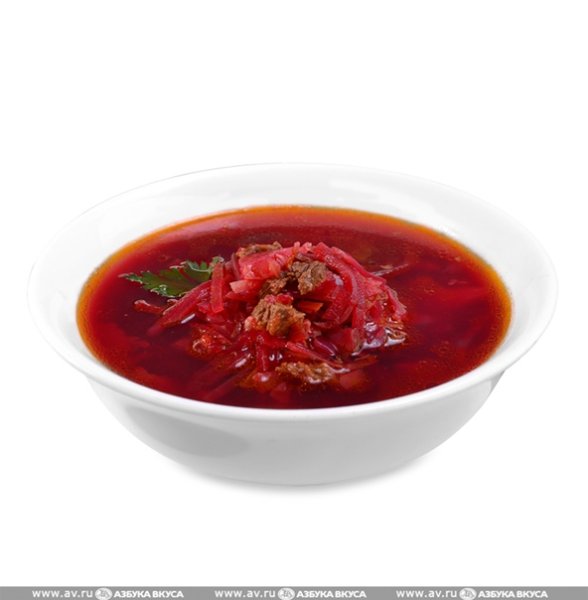 Тарелка борща на белом фоне