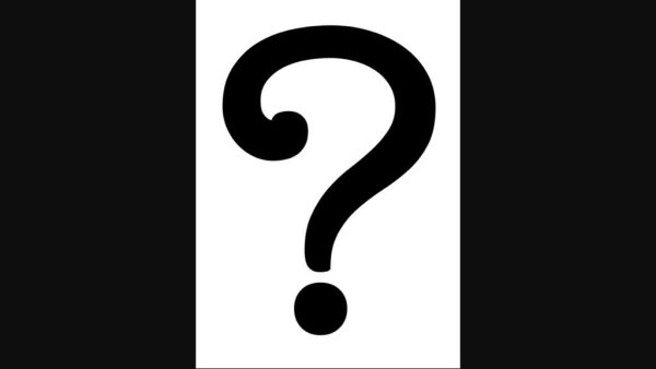 Белый знак вопроса на черном фоне