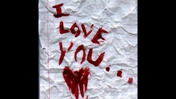 Надпись кровью на руке люблю