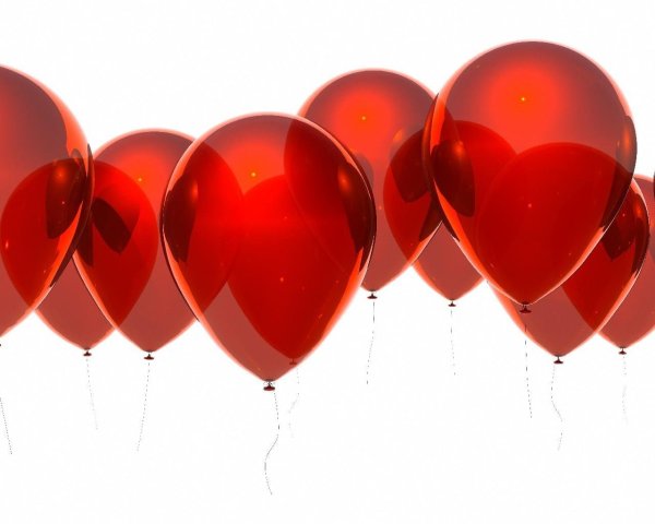 Красные шары на белом фоне