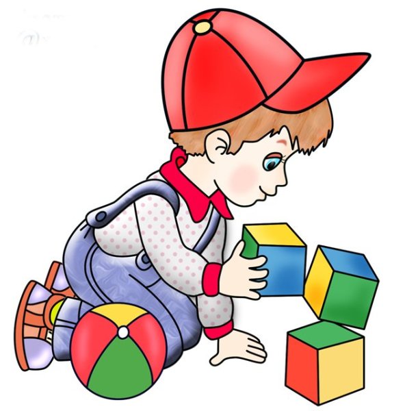 Мальчик играет в кубики