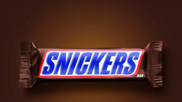 Реклама шоколада Сникерс