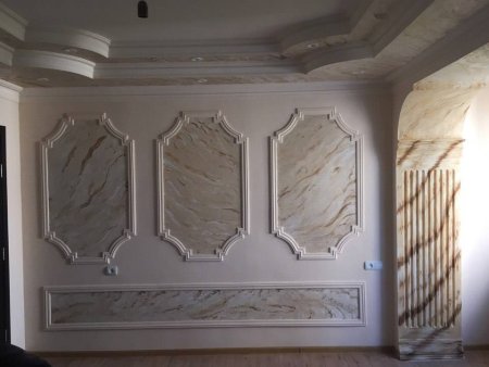 Гипсовые рамки на стенах