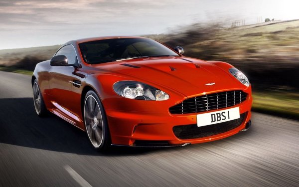 Красный спорткар Aston Martin DBS v12.