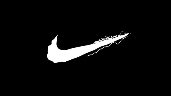 Значок Nike на черном фоне