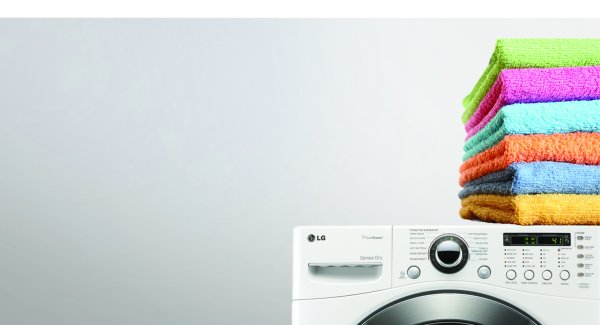 Стопка полотенец стиральная машинка