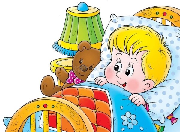 Мальчик спит в кроватке