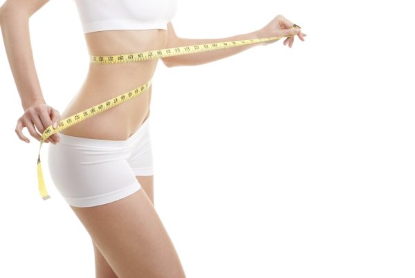 Девушка с сантиметром