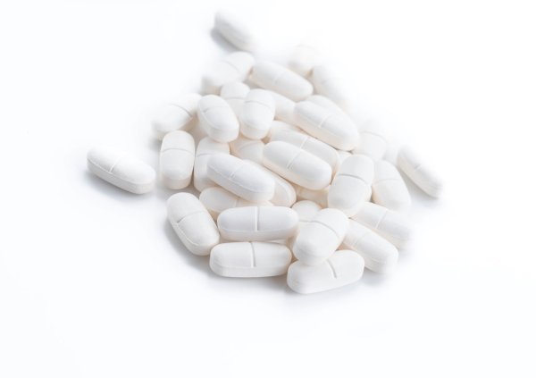 Белые капсулы
