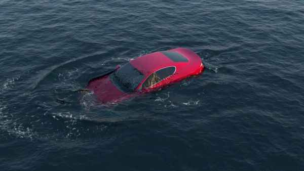 Машина тонет в океане