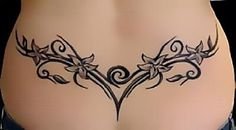 Рисунки тату на пояснице для женщин (50 фото)