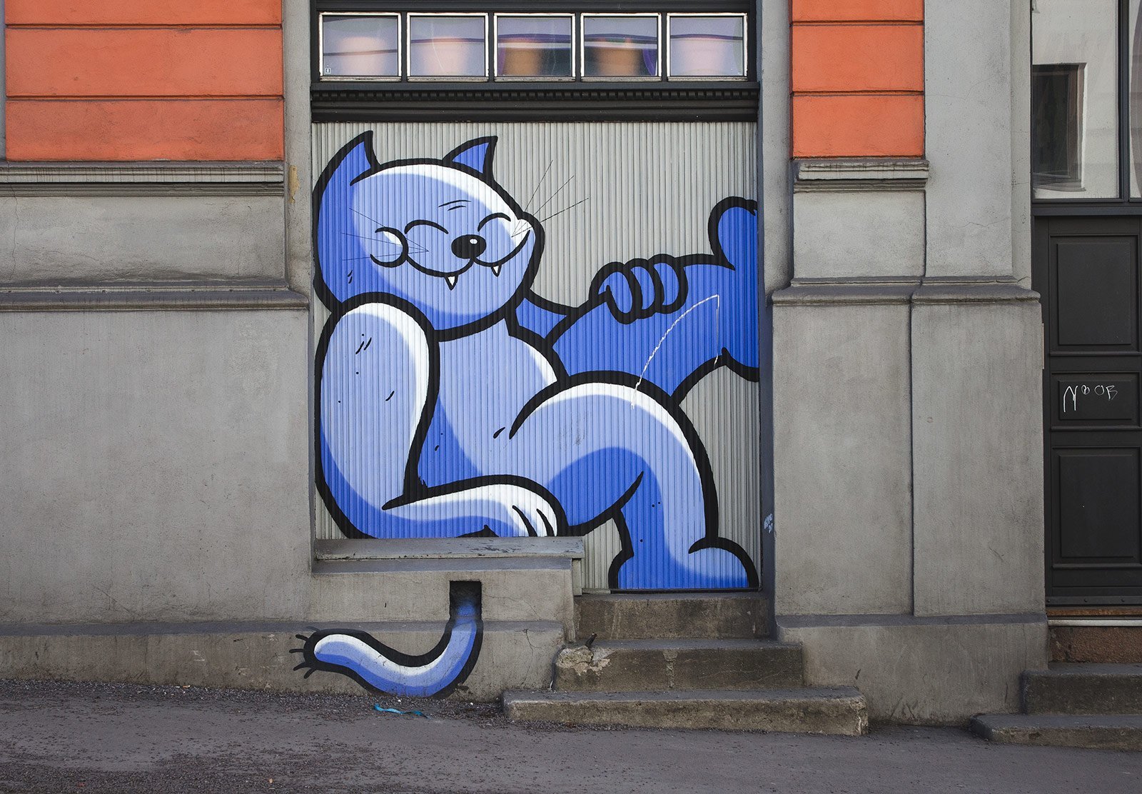 Граффити на стене кот