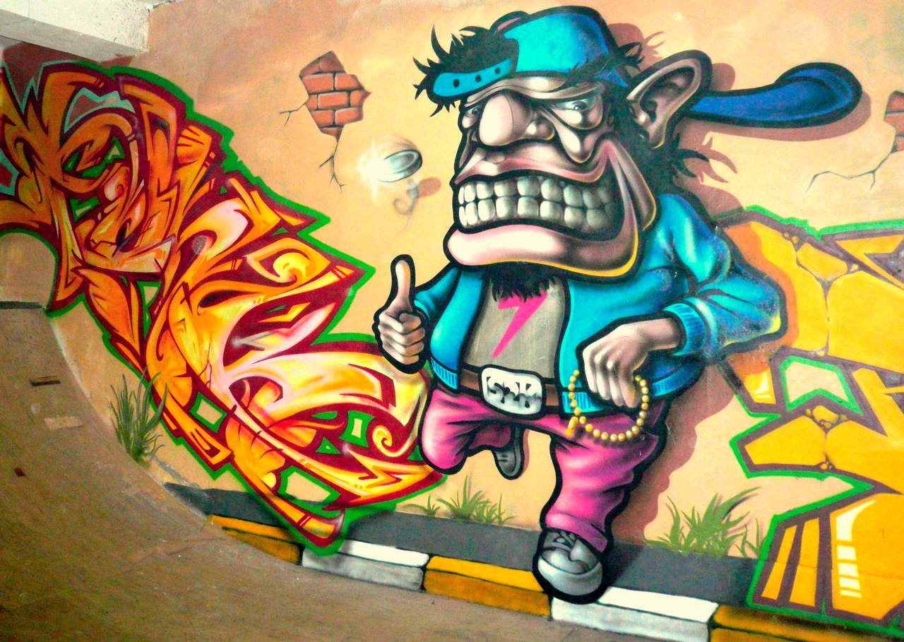 Скейтбордист граффити