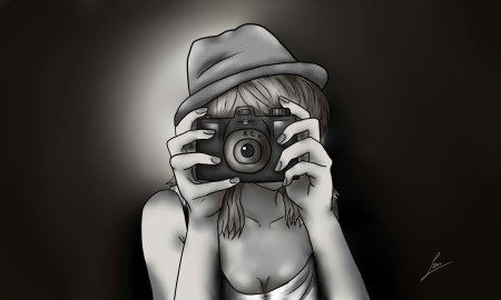 Девушка с фотоаппаратом