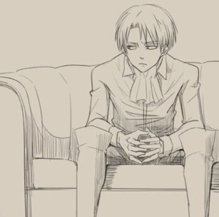 Аниме парень сидит на диване