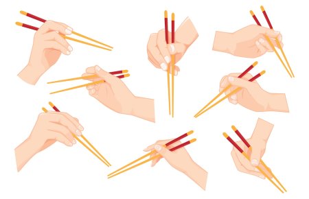 Палочки для еды в руке