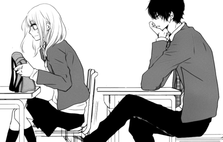 Парень сидит за партой