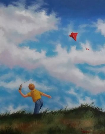 Мальчик запускает воздушного змея