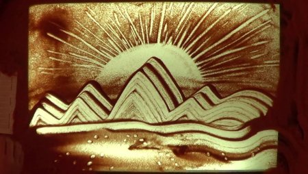 Рисование песком на стекле