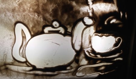 Рисование песком