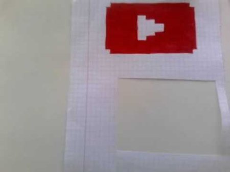 Кнопка ютуба по клеточкам