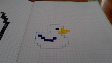 Рисунки по клеточкам уточка