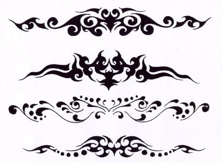 Тату трайбл на пояснице