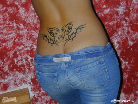 Тату трайбл на пояснице