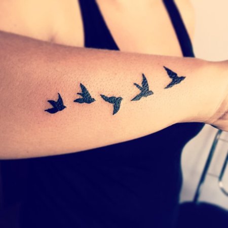 Татуировки с птицами: зачем и что они означают?